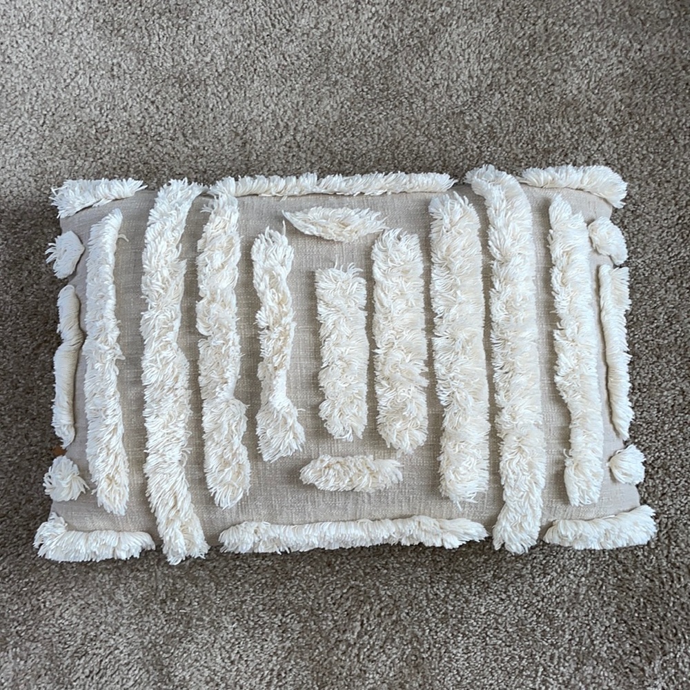 Beige and ivory throw pillow